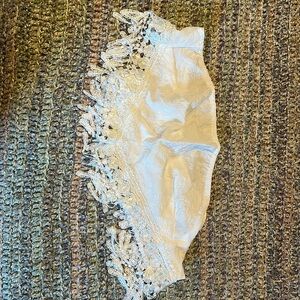 Lace-fringed cropped halter top